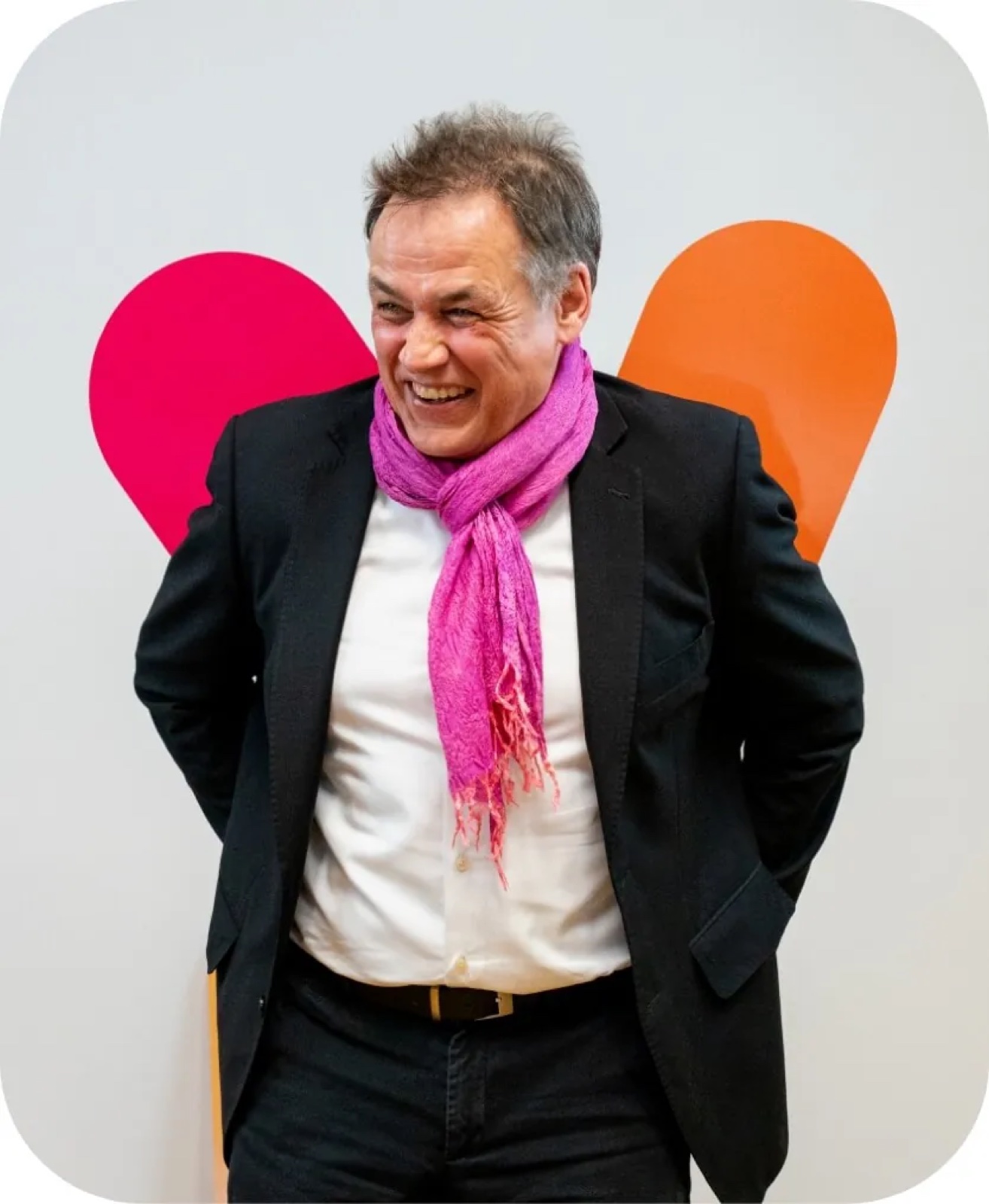 Corporate brand portrait with magenta scarf and colour shapes — Best Alex Shots, Vienna