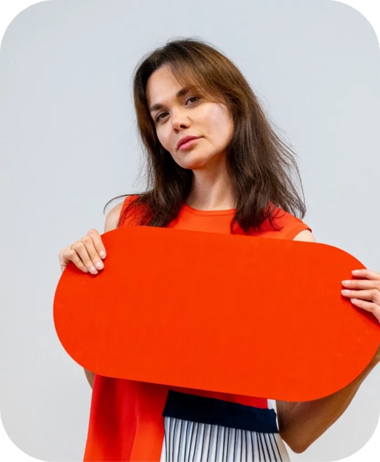 Female founder portrait holding red brand prop in studio — corporate photo by Best Alex Shots, Vienna