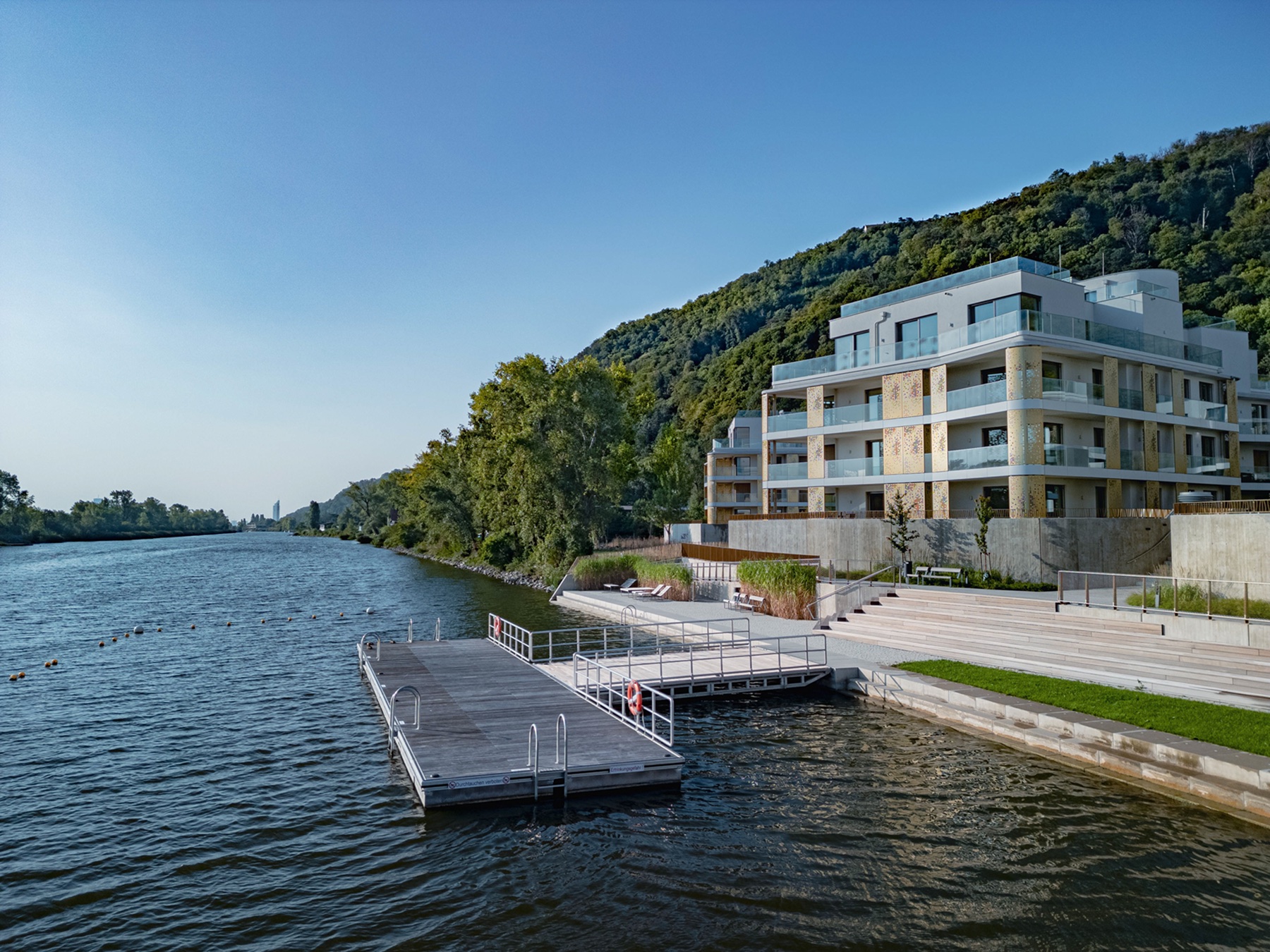 Aerial drone photo of The Shore residential complex at golden hour, Vienna — Best Alex Shots real estate photography